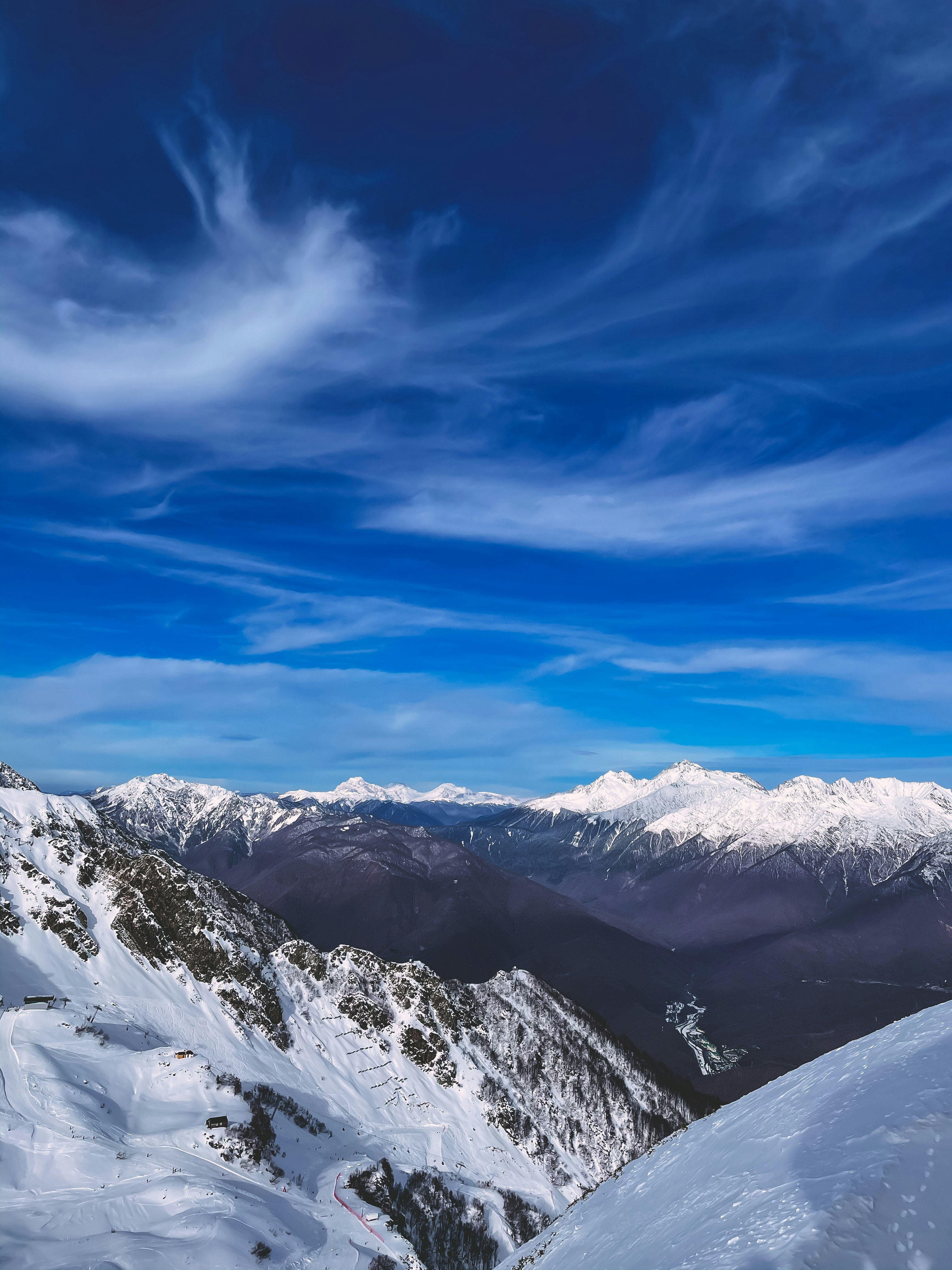 snow covered mountain under blue sky during daytime